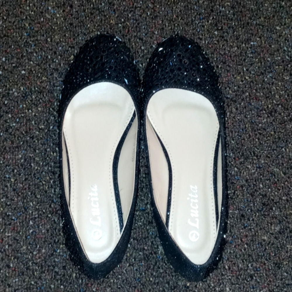 Lucita size 7 black flats